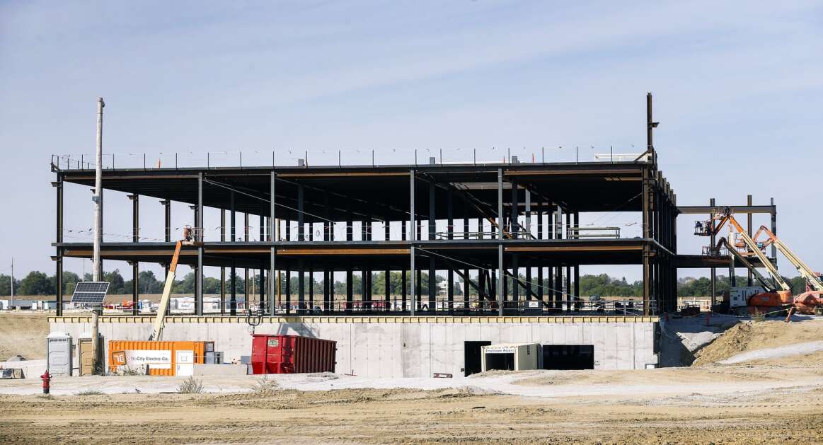 Construction continues Oct. 2, 2022, on the University of Iowa Health Care North Liberty hospital. The 469,000-square-foot facility has ballooned in price to as much as $525 million, thanks to inflation and supply chain issues. (Jim Slosiarek/The Gazette)