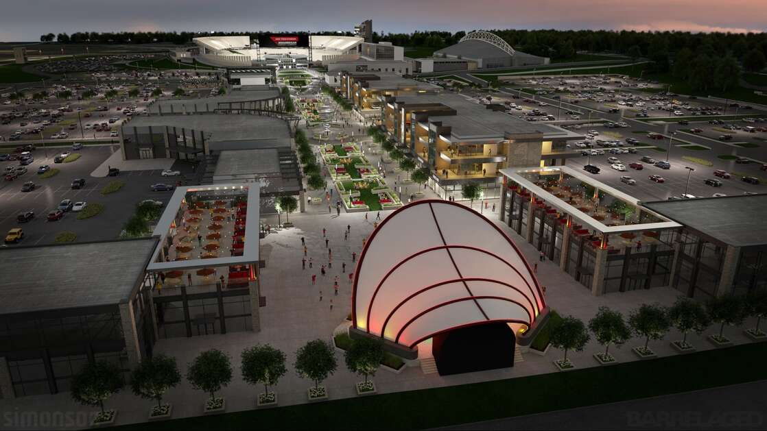 A rendering shows a nighttime scene of an amphitheater looking south to Jack Trice Stadium as part of the planned CyTown, a retail and entertainment district at the Iowa State University Campus in Ames. (Illustration from Iowa State University)