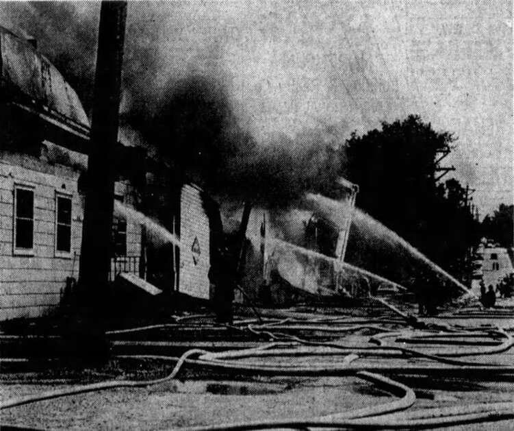 This is a view looking south on Ninth Street SW as firefighters sprayed the buildings near the warehouse that  was engulfed. The May 22, 1964, fire was one of the worst in the city’s history, though no one was injured. (Gazettarchives) 