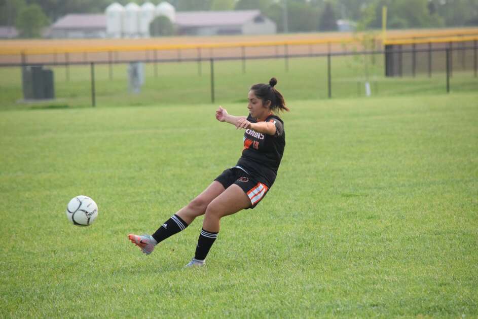 Washington’s Nicoll Torrijos takes a freekick for the Demons during their Class 1A Region 4 matchup with Mediapolis on Wednesday, May 17, 2023. (Hunter Moeller/The Union)