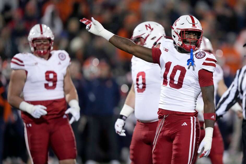 Nebraska linebacker Jimari Butler gestures on the field during an NCAA college football game against Illinois Friday, Oct. 6, 2023, in Champaign, Ill. (AP Photo/Charles Rex Arbogast)
