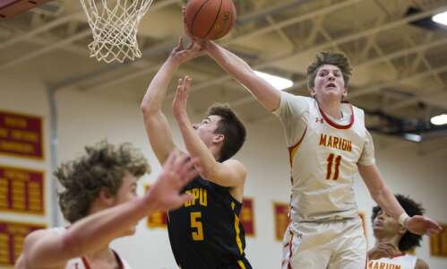 Photos: Center Point-Urbana at Marion boys’ basketball