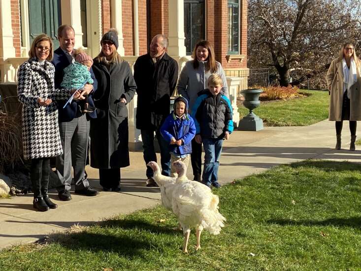 Kim Reynolds signals return to normal with turkey pardon ceremony