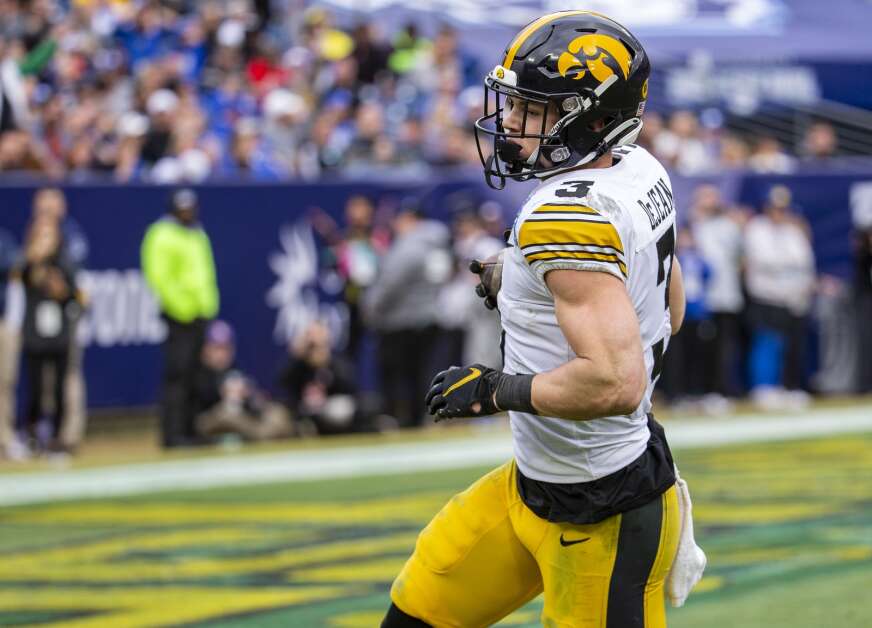 Iowa defensive back Cooper DeJean (3) returns an interception for a touchdown in the first half of the Music City Bowl at Nissan Stadium in Nashville, Tennessee on Saturday, Dec. 31, 2022. (Savannah Blake/The Gazette)