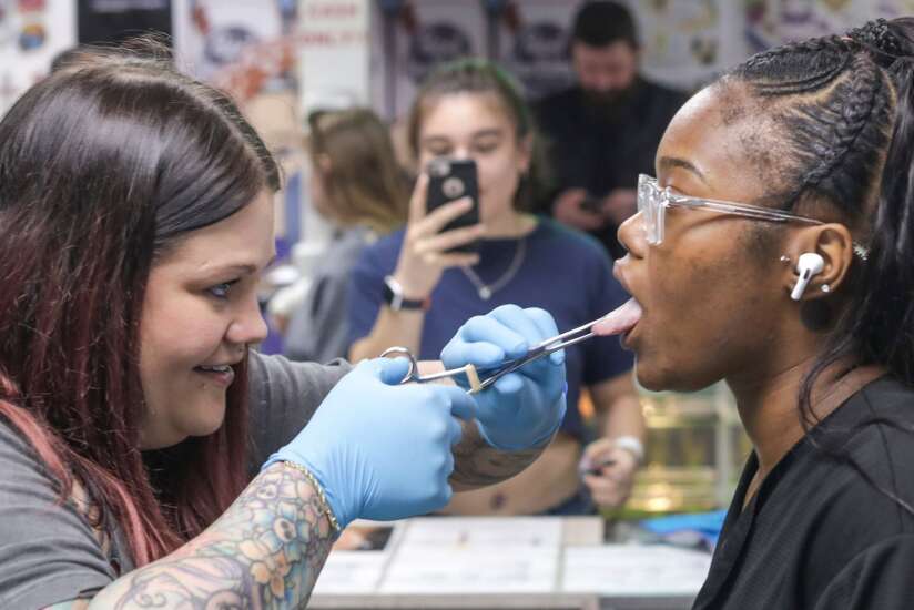 Pierced by love, tattooed with memories: Mother and daughter work together at Cedar Rapids tattoo parlor
