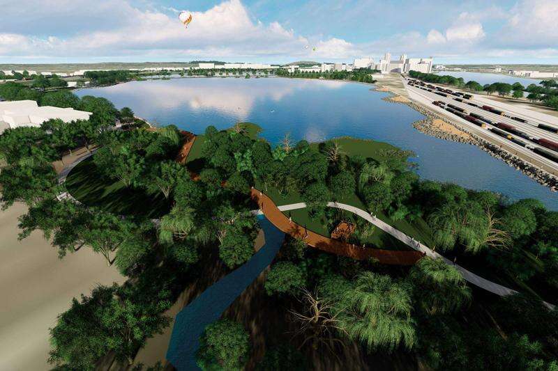 Transformed into a recreational hub, Cedar Lake would have a boardwalk and native grasses along with a kayak launch and other amenities. This rendering shows the proposed renovations from the north. (ConnectCR)