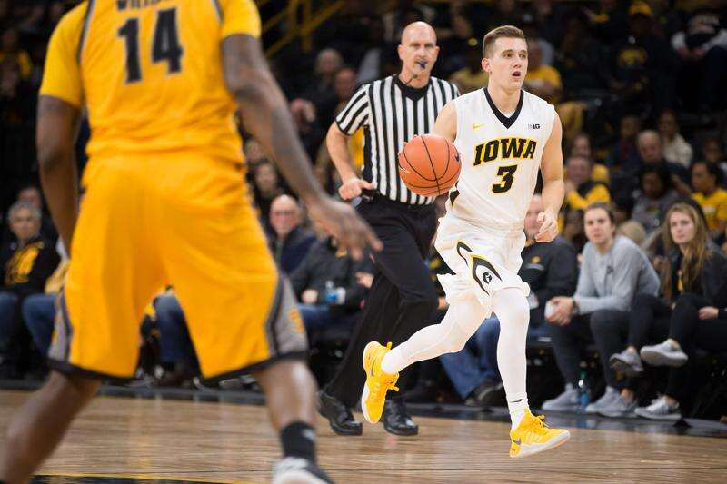 Iowa point guards still growing as Hawkeyes head to Florida