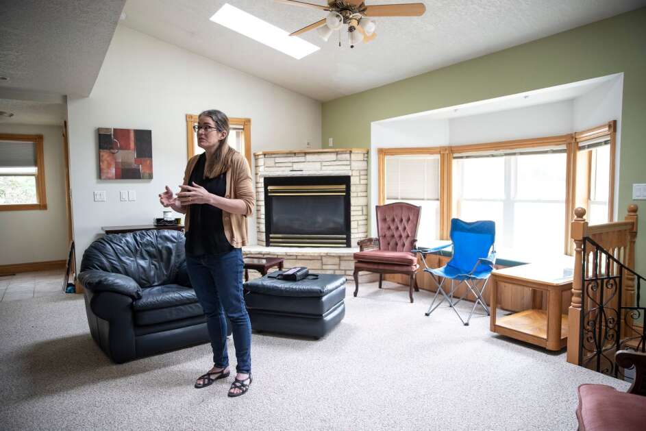Michelle Heinz, Inside Out’s Executive Director, gives a tour of the organization’s newly purchased reentry house on Monday, May 15, 2023, in Iowa City, Iowa. (Geoff Stellfox/The Gazette)