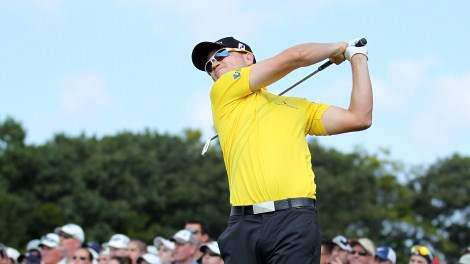 PGA: Tiger shares lead, Johnson 7th