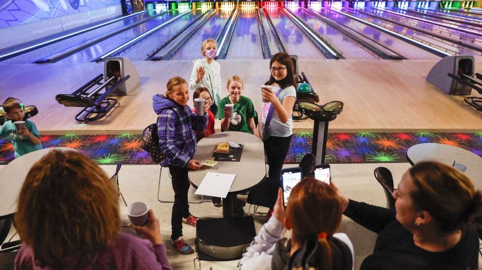 Girl Scouts celebrate Noon Year’s Eve with bowling
