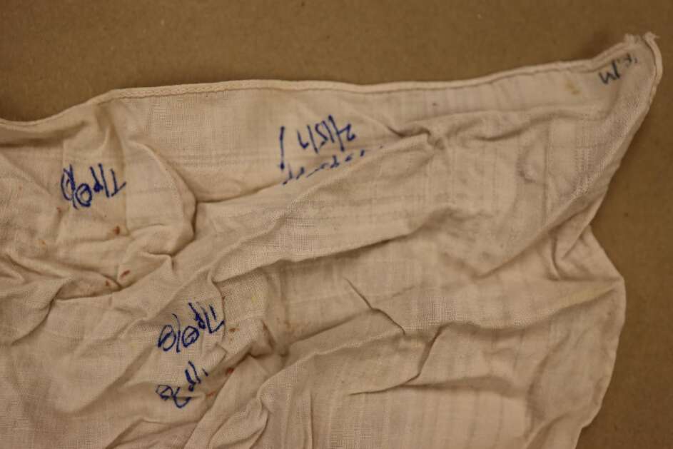 Cedar Rapids police collected a handkerchief with what appeared to be blood stains from a possible suspect in the unsolved fatal stabbing of Fred Coste, 47, on Oct. 15, 1959. (Photo submitted by Cedar Rapids Police Department) 