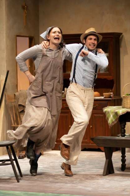 Maggie Mundy (McKayla Sturtz) and Gerry Evans (Joshua Payne) kick up their heels in "Dancing at Lughnasa." The City Circle production contines May 12 to 14, 2023, at Coralville Center for the Performing Arts. (Courtesy of Coralville Center for the Performing Arts)