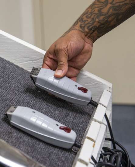Why are there different rules for prison and non-prison barbering apprenticeships in Iowa? 