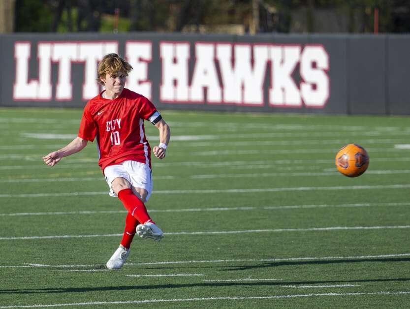 City High Little Hawks midfielder Emmit Hansen (10) shoots a penalty kick in the second half of the game against Kennedy at Iowa City High in Iowa City, Iowa on Tuesday, April 25, 2023. (Savannah Blake/The Gazette)