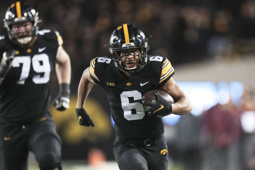 Keagan Johnson keeps up with more experienced Iowa wide receivers as true freshman