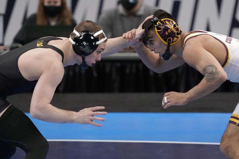 NCAA wrestling notes: Iowa's Spencer Lee grows legendary status with latest national title
