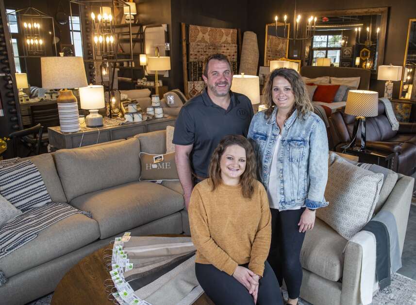 Ideal Decorating co-owners Jon Scherbring (left), Beth Gudenkauf (center) and Kelly Milbert sit in their home decor store in Solon last  Wednesday. Kelly Milbert took over her parents’ furniture and decor store in Dyersville, opening another store in Guttenberg and now in Solon. (Savannah Blake/The Gazette)