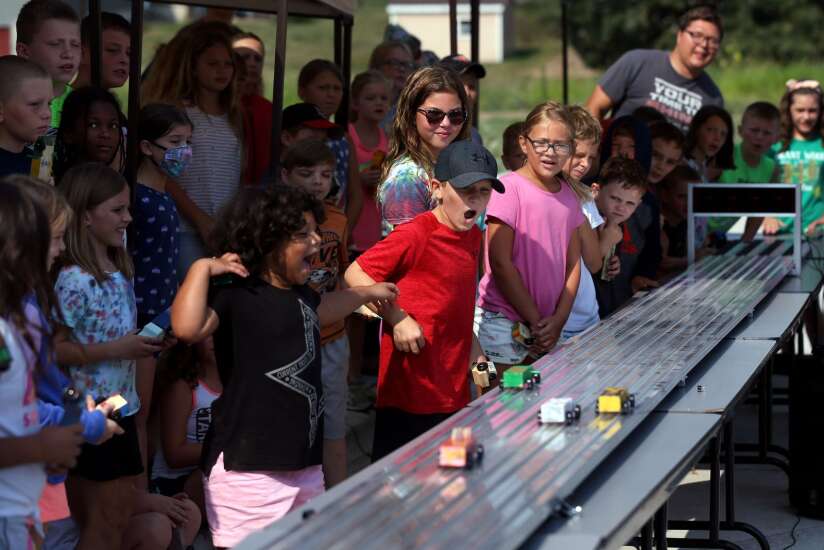 Campers race pinewood trucks at Camp Tanager