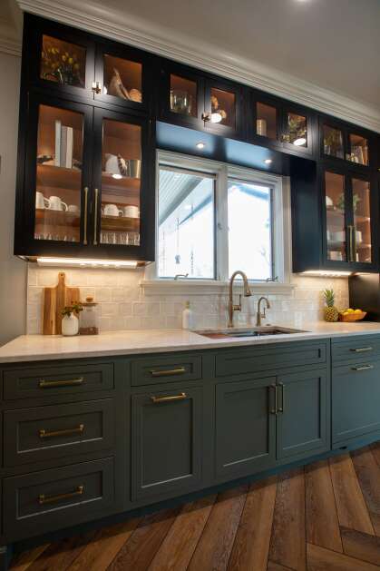 Horn’s new kitchen features deep colors that seamlessly blend with designs in neighboring rooms. (Photo Submitted)