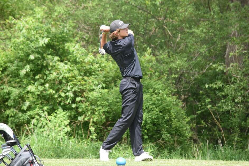 Hillcrest Academy’s Josiah Beachy tees off during the Class 1A district meet on Tuesday, May 16, 2023. Beachy and the Ravens were district champions with a 332. (Hunter Moeller/The Union)