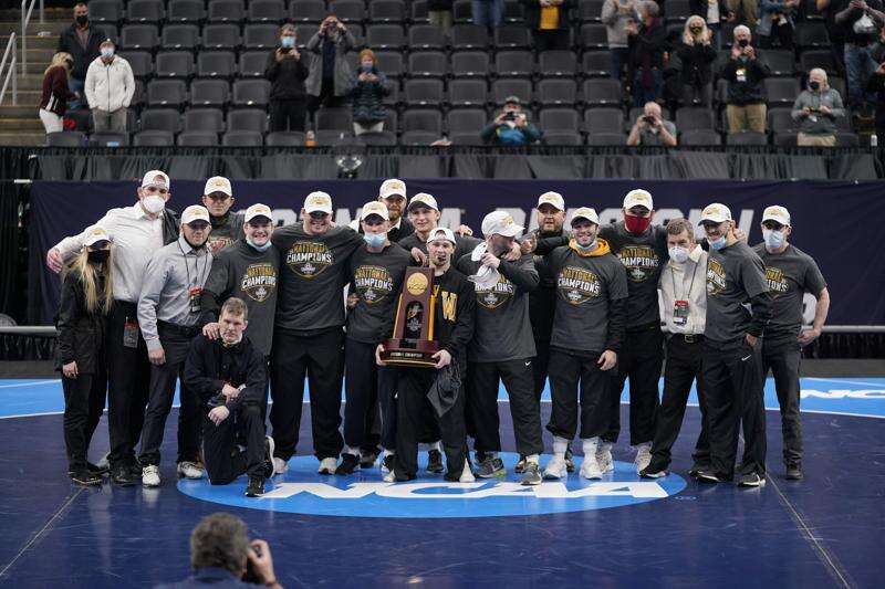Iowa reclaims NCAA wrestling crown, Spencer Lee overcomes ACL tear to win 3rd title