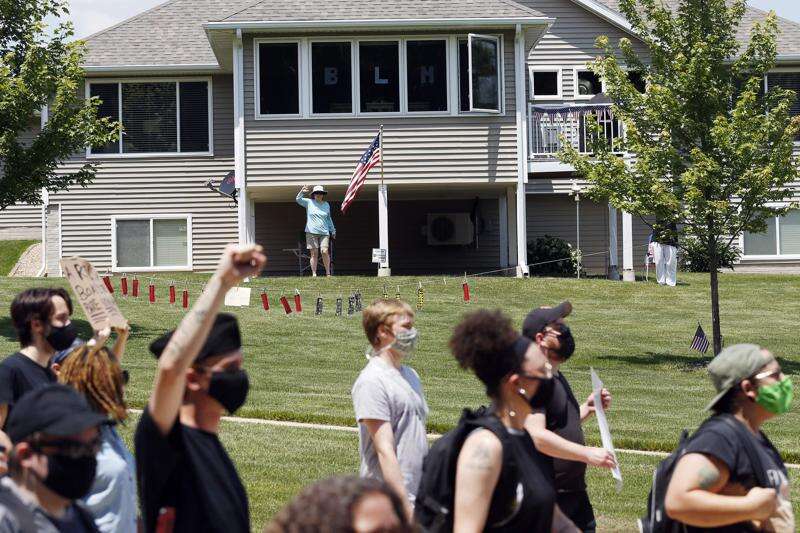 PHOTOS: Protesters rally, march to Cedar Rapids mayor’s house