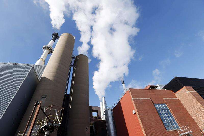 Steam rises from the University of Iowa Power Plant in Iowa City. (The Gazette)