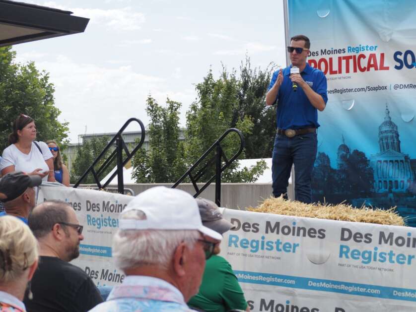 Libertarian presidential candidate Chase Oliver speaks Aug. 19 at the Des Moines Register Political Soapbox at the Iowa State Fair in Des Moines. (Photo by Robin Opsahl/Iowa Capital Dispatch)