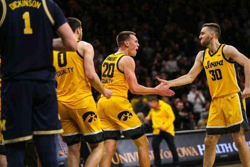 Photos: Iowa men’s basketball rallies to top Michigan in overtime