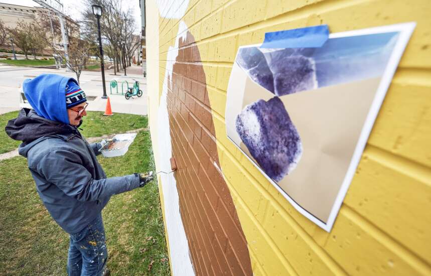 Swiss artist duo creates downtown Cedar Rapids mural honoring community-fueled ConnectCR project