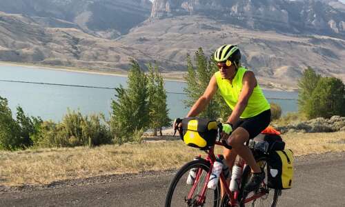 Maquoketa man rides bicycle across county, tells his story Sunday