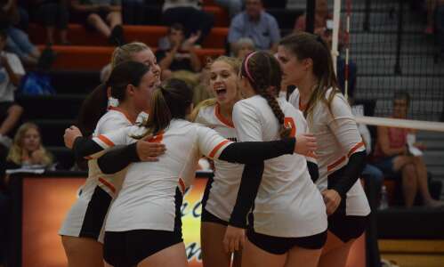 Demon volleyball topped in five sets