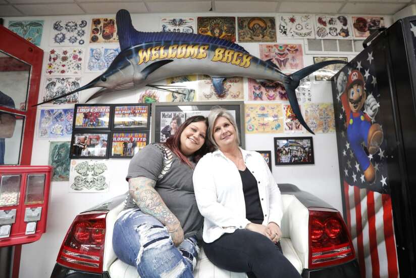 Pierced by love, tattooed with memories: Mother and daughter work together at Cedar Rapids tattoo parlor