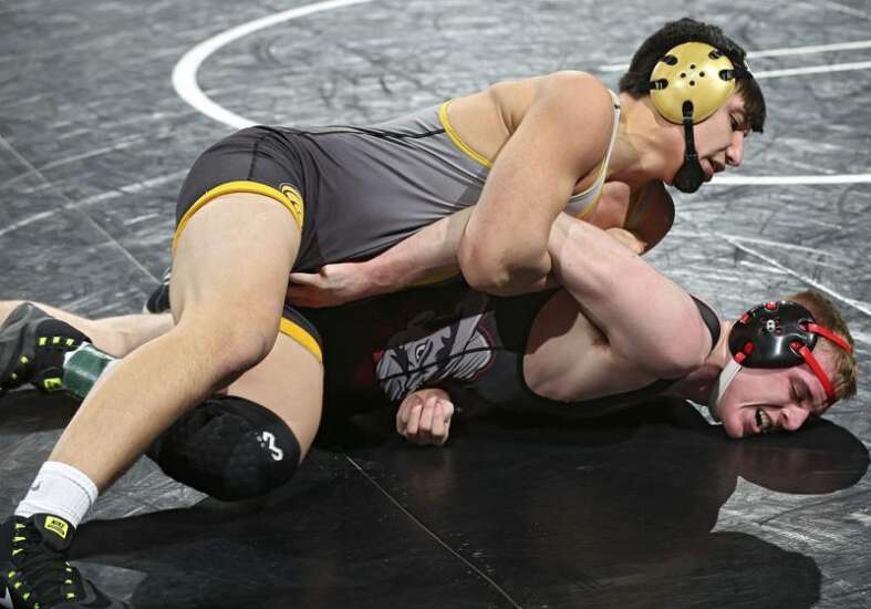 State wrestling notes: Mid-Prairie’s Visouth Peterschmidt looking to one-up older brothers