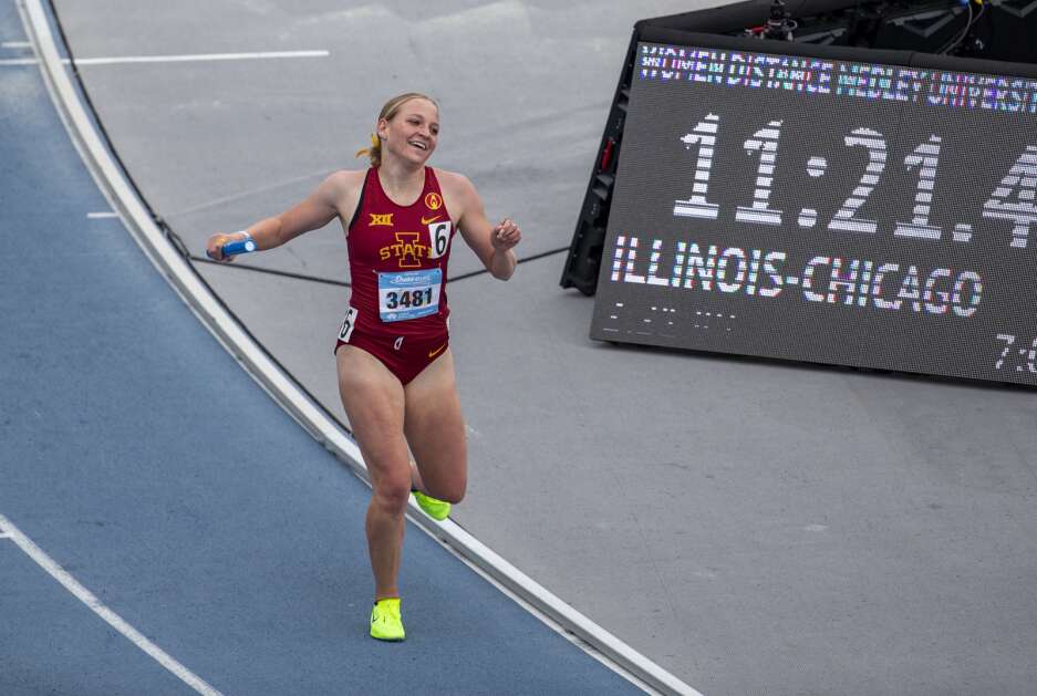 Iowa State’s Ashlyn Keeney smiles as she runs past the finish line to secure the win for the Cyclones in the women’s distance medley during day three of the Drake Relays at Drake Stadium on Saturday. (Savannah Blake/The Gazette)
