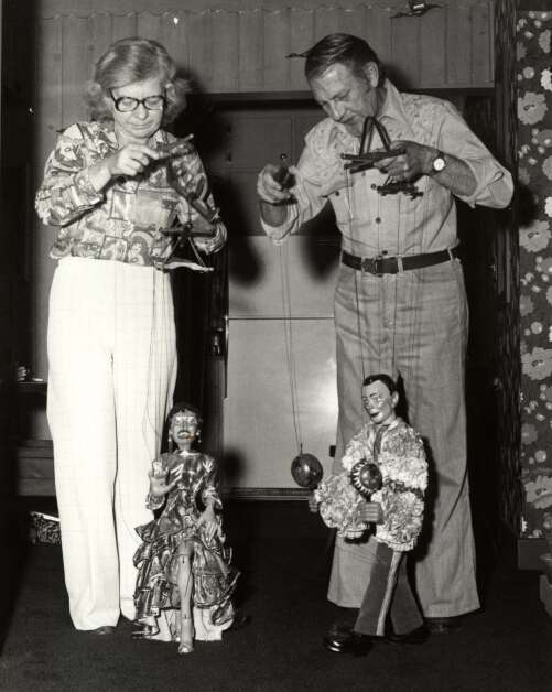 Nola and Bruce Bucknell show two of their marionettes, around 1970. (The History Center)