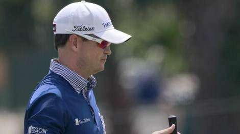PGA: Play suspended, Rory leads, Johnson slips
