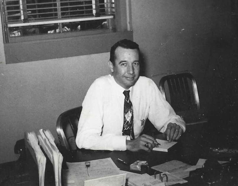 Fred Coste sits at his desk in the Family Finance Corporation office in Baltimore, Md., before being transferred to the Cedar Rapids office in 1958. Coste was fatally stabbed during what police believe was a robbery Oct. 15, 1959. The case remains unsolved. (Photo submitted by Dianne Martin) 