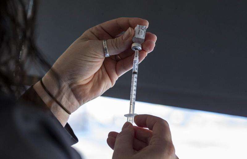 University of Iowa administers state’s first COVID-19 vaccine