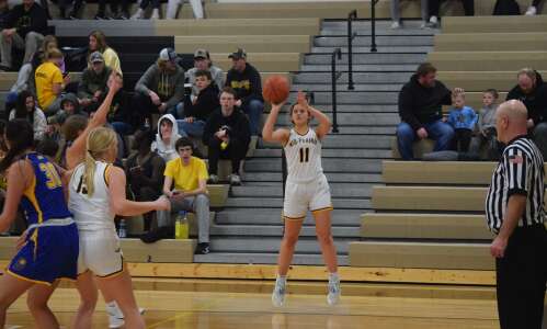 Mid-Prairie girls hold on for win