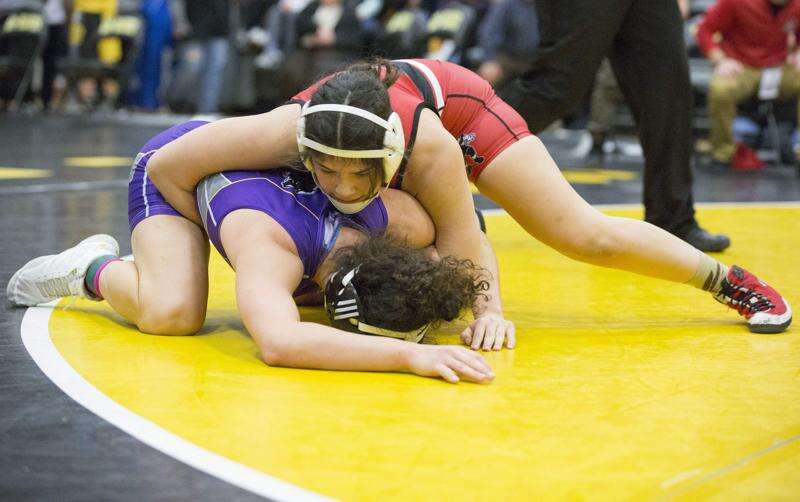 Lisbon’s Jannell Avila wins a girls’ state wrestling title, with state champion brother in her corner