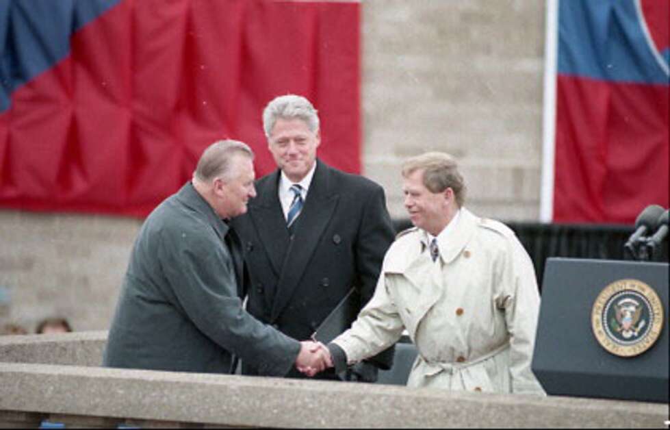 In an Oct. 21, 1995, photo, President Michel Kovac (left) of the Slovak Republic shakes hands with President Vaclav Havel (right) of Czechia -- also known as the Czech Republic -- at the dedication of the new National Czech & Slovak Museum & Library in southwest Cedar Rapids. Joining them on the balcony is then-President Bill Clinton. From the beginning of the 1993 Velvet Divorce, which peacefully separated Czechoslovakia, the two nations have maintained a friendly relationship. "They're like brothers and sisters. They're complementary, they enhance each other," said Cecilia Rokusek, the museum's current president and chief executive officer. (The Gazette)
