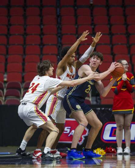 Photos: Marion stumbles against Heelan in boys’ state basketball quarterfinals