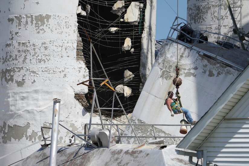 Crews recover man missing under collapsed Iowa grain silo