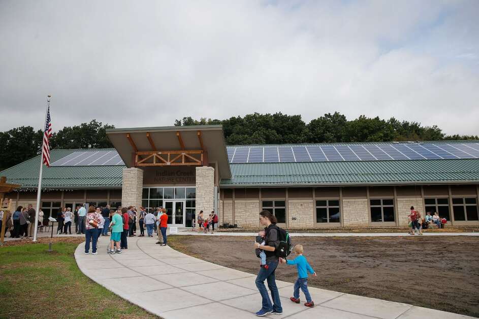 People arrive for the grand opening of the new "Amazing Space" building at Indian Creek Nature Center in Cedar Rapids on Friday, Sept. 16, 2016. The nature center has events for all ages going on throughout the weekend to celebrate the opening of the new facility. (Adam Wesley/The Gazette)