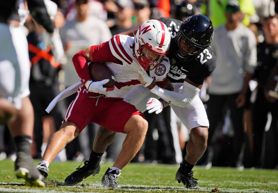 Colorado special teams player Carter Stoutmire, right, tackles Nebraska punt returner Billy Kemp IV after a short return in the first half of an NCAA college football game Saturday, Sept. 9, 2023, in Boulder, Colo. (AP Photo/David Zalubowski)