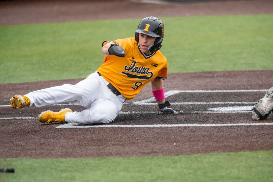 Iowa’s Kyle Huckstorf (9) scores a run during a game between the Iowa Hawkeyes and the Michigan State Spartans at Duane Banks Field in Iowa City, Iowa on Sunday, May 14, 2023. The Hawkeyes defeated the Spartans 5-1 to sweep the three game series. (Nick Rohlman/The Gazette)