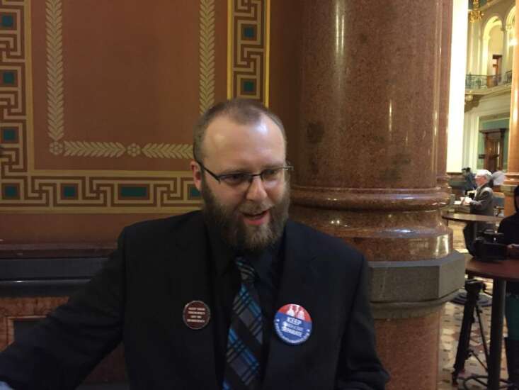 Atheist calls on ‘holy trinity of science’ in Iowa House invocation