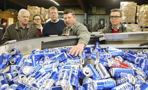 Reynolds OKs changes to Iowa’s recycling law