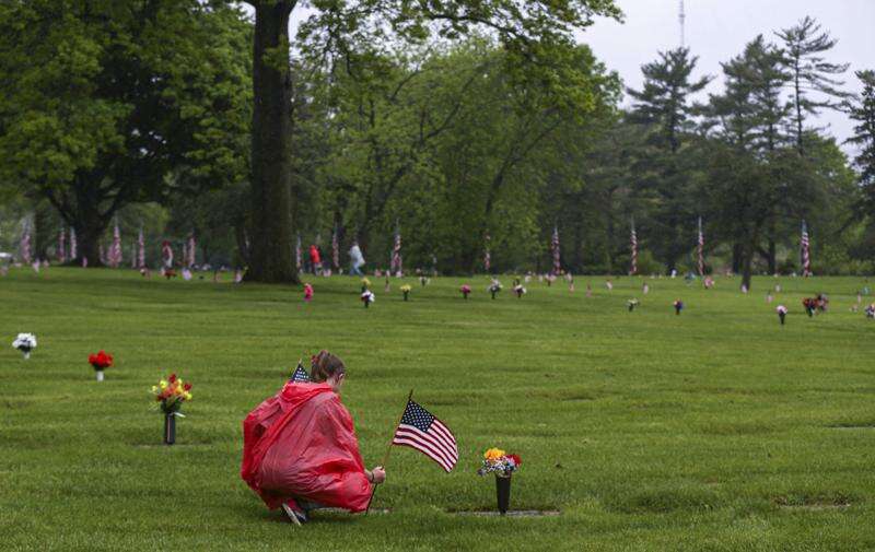 Photos: Memorial Day flag placement at Cedar Memorial Cemetery
